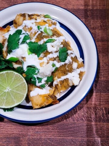 Chicken enchiladas with a roasted tomatillo sauce.